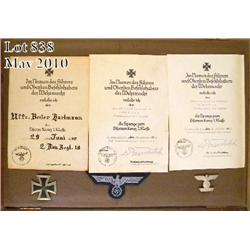 Lot of assorted WW II original German documents in  three beautiful wood and glass display cases  in