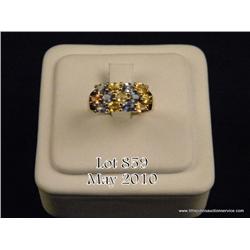 Elegant 10 karat yellow gold ladies ring set with  nice blue and yellow sapphires weighing approx.  