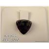 Image 1 : 7.71 carat triangular shaped amethyst. $50-$100.