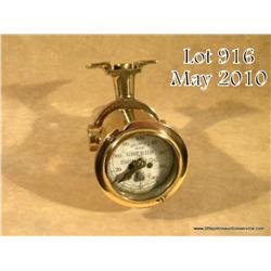 Solid brass nautical “Cherub” Walker’s Patent Ship  Log gauge, approx. 4” in diameter with a white  