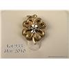 Image 1 : One pendant in the shape of clover set with a  round  diamond in 14 kt yellow gold. Est.  $200-$300.