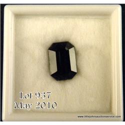 6.53 carat emerald cut dark blue sapphire.  $300-$600.