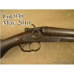 Remington Arms Co. SxS exposed hammer shotgun,  12  gauge, 30” Damascus barrels, checkered wood  sto