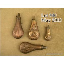 Lot of four antique brass powder flasks including  a large James Dixon & Sons game scene embossed  (