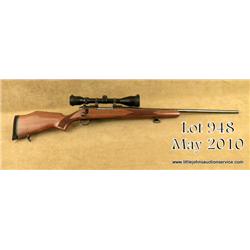 Weatherby Mark V bolt-action rifle, 7mm REM MAG  cal., 24” barrel, blue finish, checkered wood  stoc