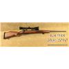 Weatherby Mark V bolt-action rifle, 7mm REM MAG  cal., 24” barrel, blue finish, checkered wood  stoc