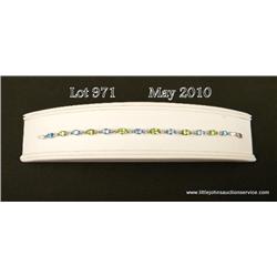 Terrific 10 karat white gold ladies bracelet set  with alternating MQ cut Peridot and blue topaz  we