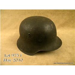 WWII German M42 combat helmet. Retains approx. 95%  original field grey painted finish. Leather  por