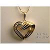 Image 2 : One heart shaped pendant set with 14 diamonds  (0.28ct) in 14kt yellow gold with a chain. Est.  $400
