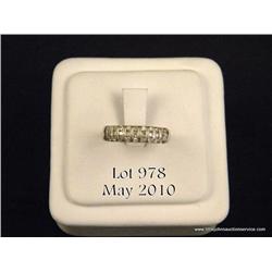 One ladies diamond ring set with 27 full cut  diamonds (approx. wt 0.33ct) in 14kt white gold.  Est.