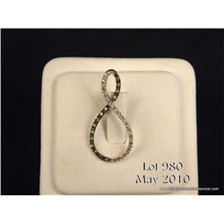 One infinity (love knot) pendent set with diamonds  in 14kt white gold. Est. $450-$600.
