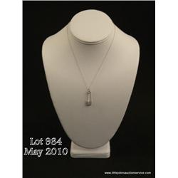 Finely carved 14 karat white gold ladies ‘safety  clip’ design pin pave set with 11 round diamonds  