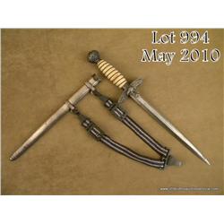 Luftwaffe dress dagger and scabbard in overall  good condition showing a very good unmarked blade,  