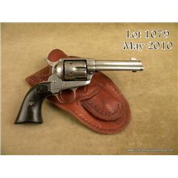 Colt Single Action Army revolver, .38-40 caliber,  4-3/4" barrel, grey patina finish, hard rubber  g
