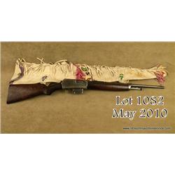 Winchester model 1907 self-loading rifle in .351  caliber, blued finish, Indian carved stock,   show