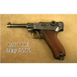 1908 Commercial Luger by D.W.M. in .30 cal.,  serial #50454, in fine to excellent condition. The  pi
