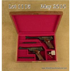 Magnificent pair of factory engraved and gold  inlayed Colt Woodsman .22 caliber semiautomatic  targ