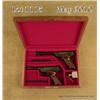 Image 1 : Magnificent pair of factory engraved and gold  inlayed Colt Woodsman .22 caliber semiautomatic  targ