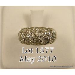 One ladies filigree heart design with diamonds  (0.12ct ) in 14 kt white gold. Est. $250-$450.