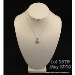 Elegant 14 karat white gold ladies pendant set  with a center fine opal weighing approx.1.00 carat  
