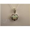 Image 2 : Elegant 14 karat white gold ladies pendant set  with a center fine opal weighing approx.1.00 carat  