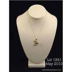 Stylish 14 karat yellow gold ladies handmade  ballerina pendant set with rubies, sapphires and  seed