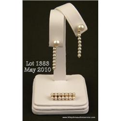 Nice 14 karat yellow gold ladies pearl earrings  and matching pin/pendant. Retail $850.00 Estimate  