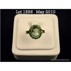 Fashionable 10 karat yellow gold ladies ring set  with a center green Fluorite weighing over 5.00  c