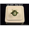 Fashionable 10 karat yellow gold ladies ring set  with a center green Fluorite weighing over 5.00  c