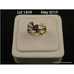 10 karat yellow gold ladies three stone design  ring set with Amethyst, blue topaz and peridot  weig