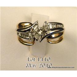 Ladies 14kt two-tone ring, center 0.25 carat, side  diamonds 0.50 carat. $400-$800.