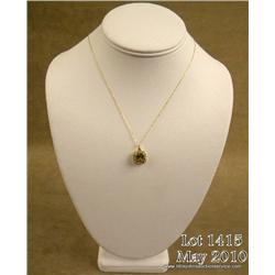 Elegant 14 karat yellow gold ladies necklace set  with a center golden green quartz weighing over  3