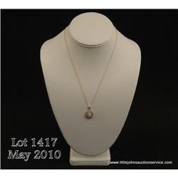 Attractive 10 karat yellow gold ladies pendant set  with 10 nice color opals and surrounded by 30  r