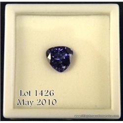 2.72 carat triangular shaped tanzanite. $200-$400.