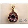 Image 2 : Vibrant 10 karat yellow gold ladies pendant set  with a center pear shape Amethyst weighing approx. 