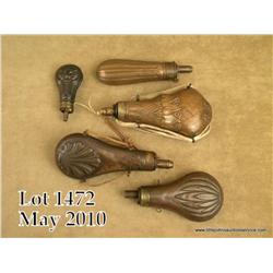 Lot of five antique brass powder flasks all in  uncleaned good to very good condition including a  l