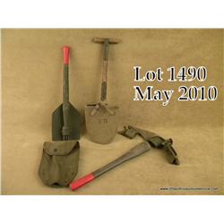 Lot of three U.S. military trench tools including  an iron pick with wood handle and green woven bel