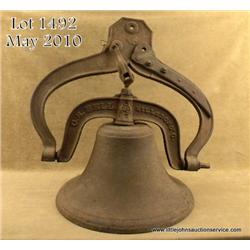 Large old cast iron bell and cast iron hanger  marked “C.S. Bell, Hillsboro, O.” in overall  unclean