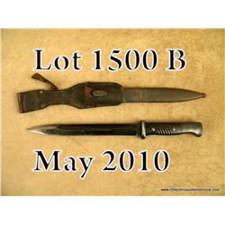 German bayonet, metal scabbard and leather hanger  in overall good condition with some sharpening to