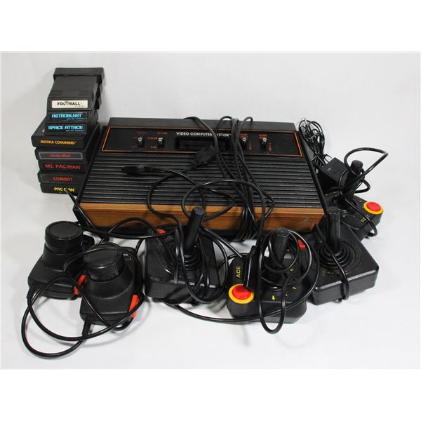 #287 Atari 2600 System w/ Controllers + Pac-man