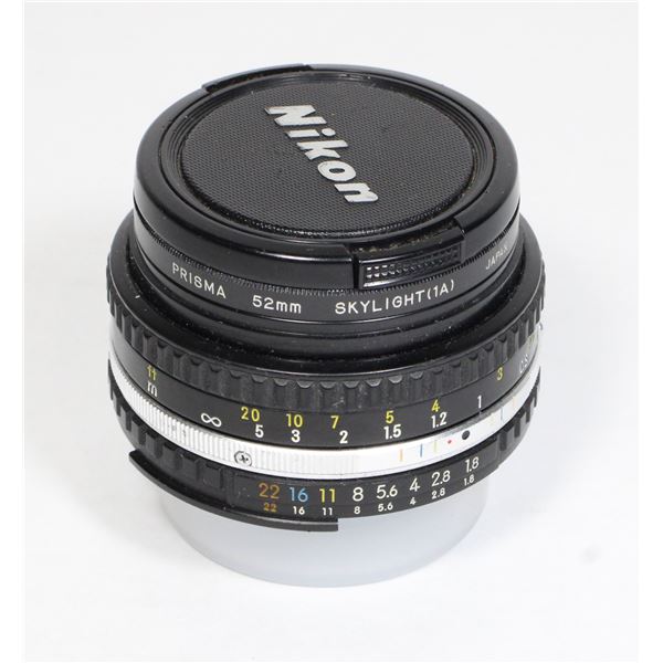 #724  Nikon Lens 50mm Nikkor 50mm 1:2.8 Skylight