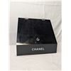 Image 1 : Chanel Acrylic Display Box with white sequin flower