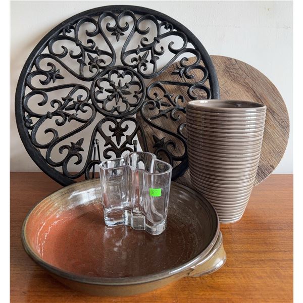 Home Decor Items: Cast Iron Trivet, Wooden Board, Vase, Crystal Votive, and Stoneware Dish