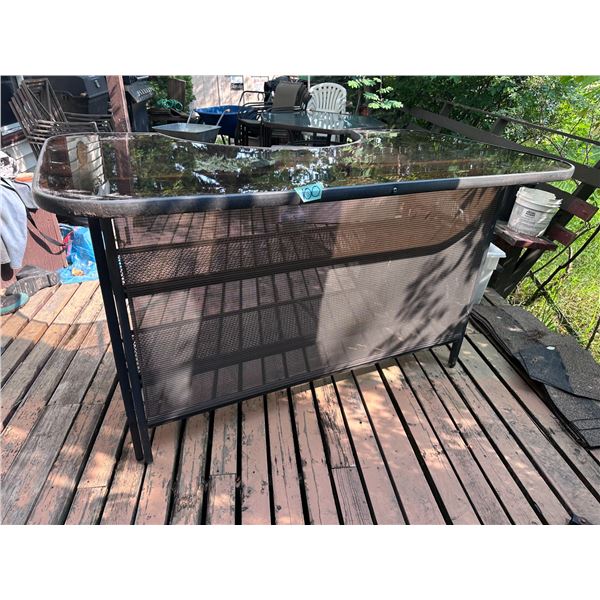 Outdoor bar with chairs