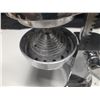Image 3 : Cupini Design manual lever-style citrus juicer.
