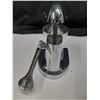 Image 4 : Cupini Design manual lever-style citrus juicer.