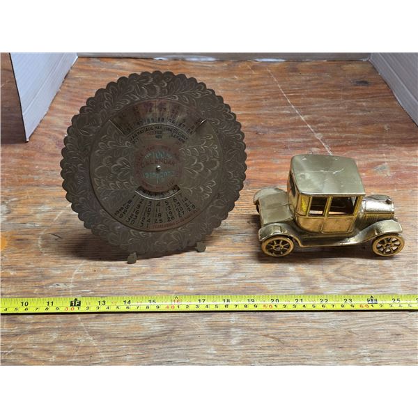 100 year calender and brass car
