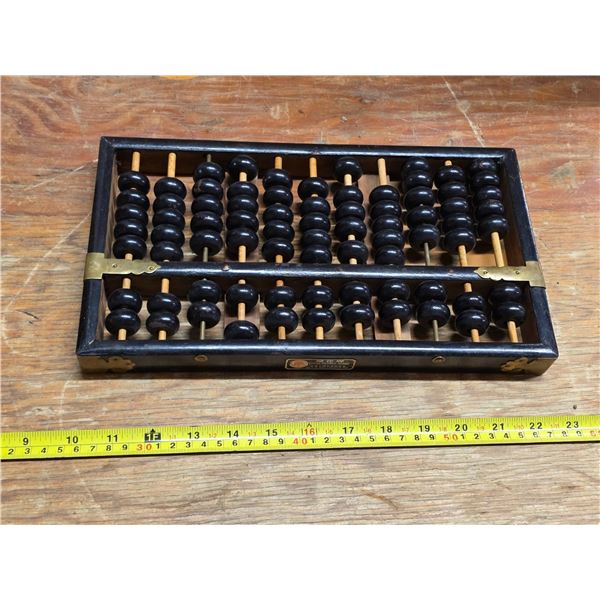 Wood and brass abacus