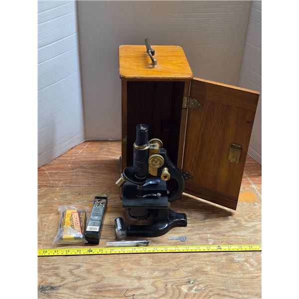 Vintage microscope in wooden box- has key