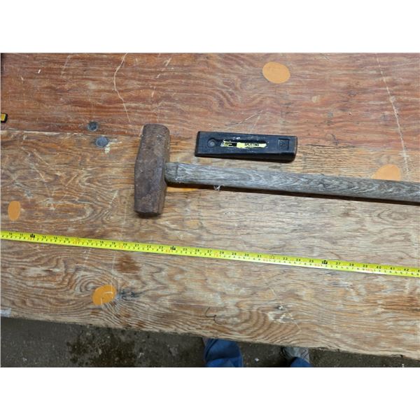 Splitting wedge and antique sledgehammer